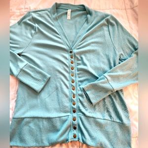New Without Tags.  Never worn. Zenana Outfiters sky blue cardigan. Size:1X